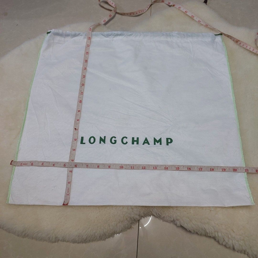 Authentic Longchamp dust bag 18.5x21 inches (Category: Luxury Bags & Wallets) located in Manila. Submitted by jfluxury.co (Listing ID 1383652407, Image 3). Description: excellent condition no flaws bought in Japan 🇯🇵 💯% Authentic. 😊 Money back guarantee. 😊 Clean and ready to use na..