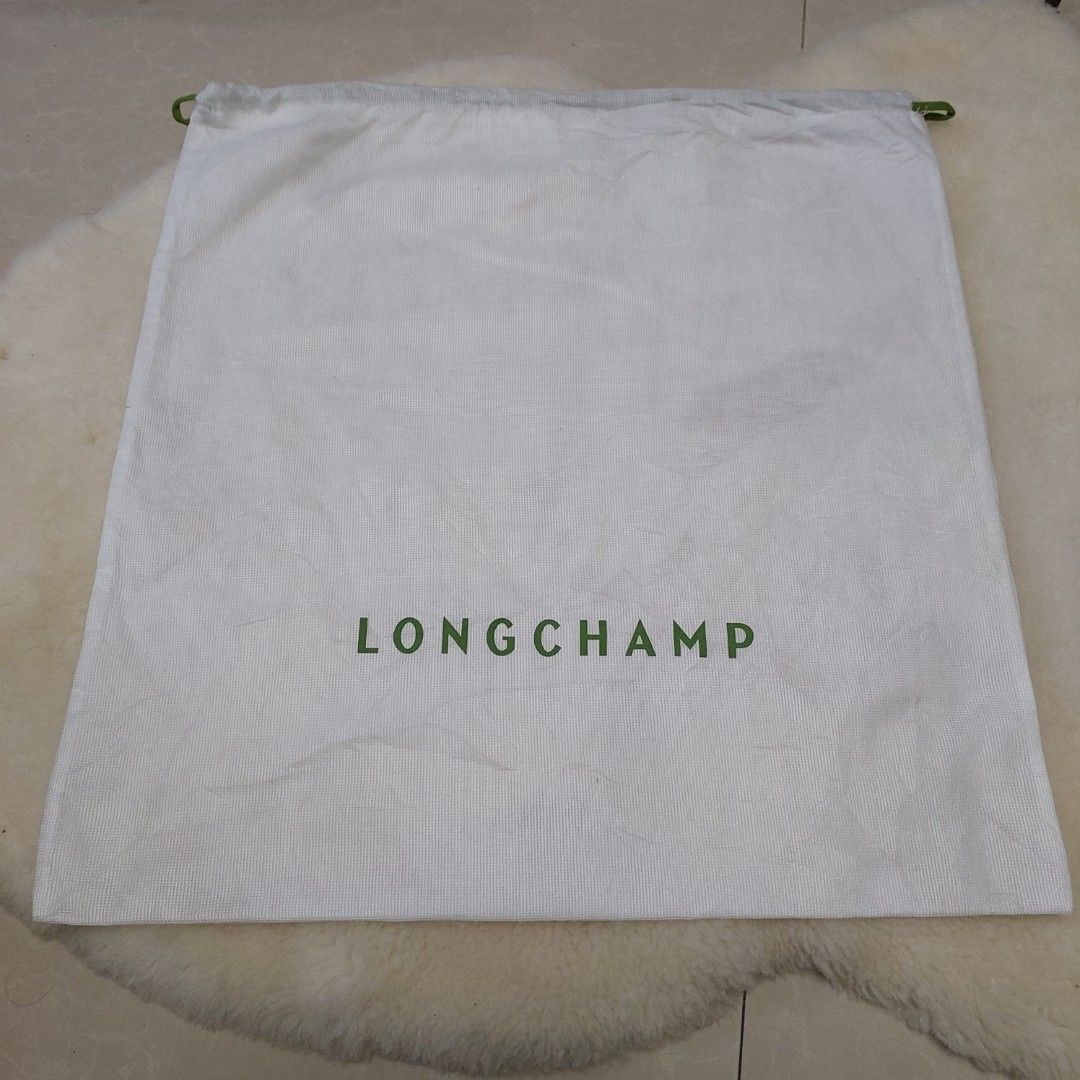 Authentic Longchamp dust bag 19.5x19 inches (Category: Luxury Bags & Wallets) located in Manila. Submitted by jfluxury.co (Listing ID 1383652458, Image 2). Description: excellent condition no flaws bought in Japan 🇯🇵 💯% Authentic. 😊 Money back guarantee. 😊 Clean and ready to use na..
