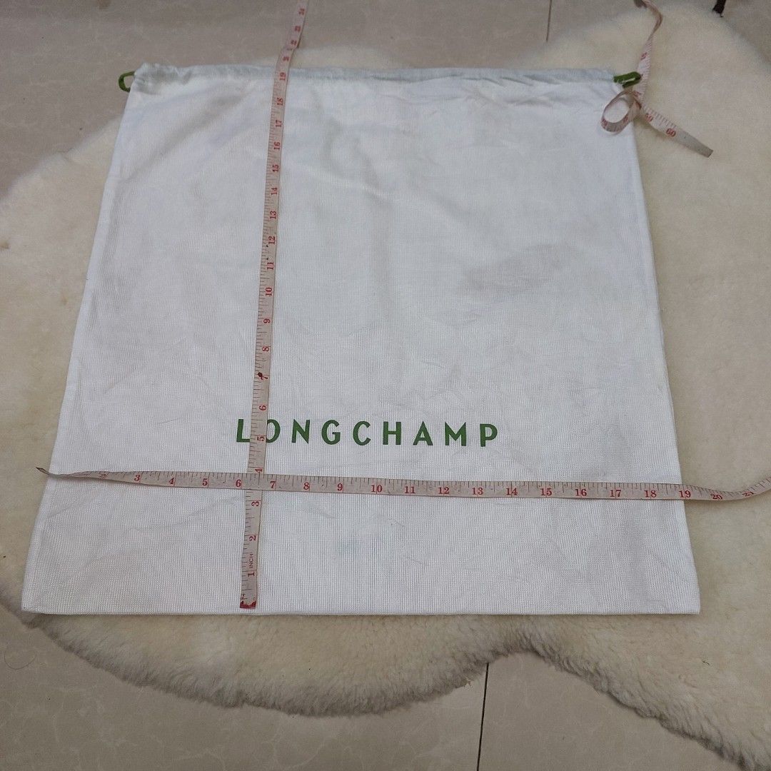 Authentic Longchamp dust bag 19.5x19 inches (Category: Luxury Bags & Wallets) located in Manila. Submitted by jfluxury.co (Listing ID 1383652458, Image 3). Description: excellent condition no flaws bought in Japan 🇯🇵 💯% Authentic. 😊 Money back guarantee. 😊 Clean and ready to use na..