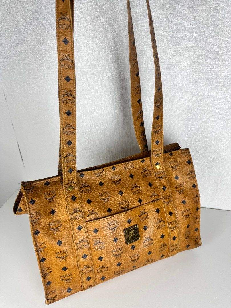 [Authentic] MCM GLAM TOTEBAG VISETOS LEATHER (Category: Luxury Bags & Wallets) located in Tabuk. Submitted by meksieclosetph (Listing ID 1383541303, Image 1). Description: Guaranteed Authentic MCM Germany Dm for exact measurement •Can fit laptop, documents etc....