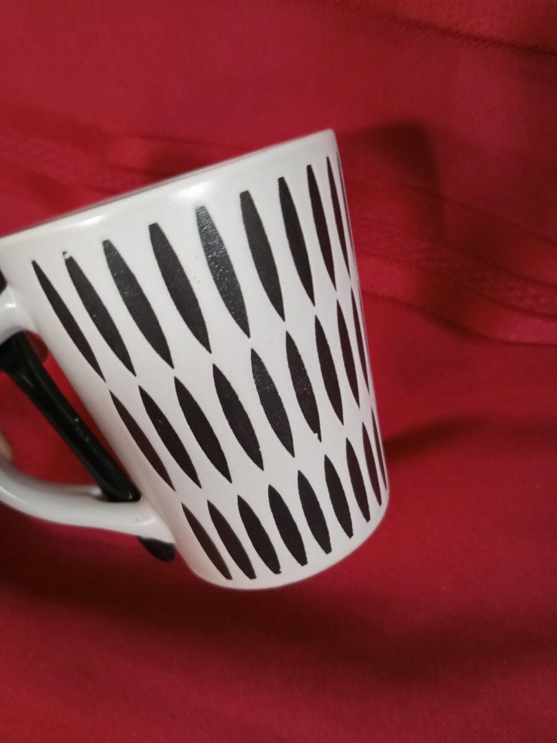 Black and White Ceramic Mug with Teaspoon (Category: Coffee & Tea Tableware) located in Quezon City. Submitted by jojoleen28 (Listing ID 1383524600, Image 2). Description: .
