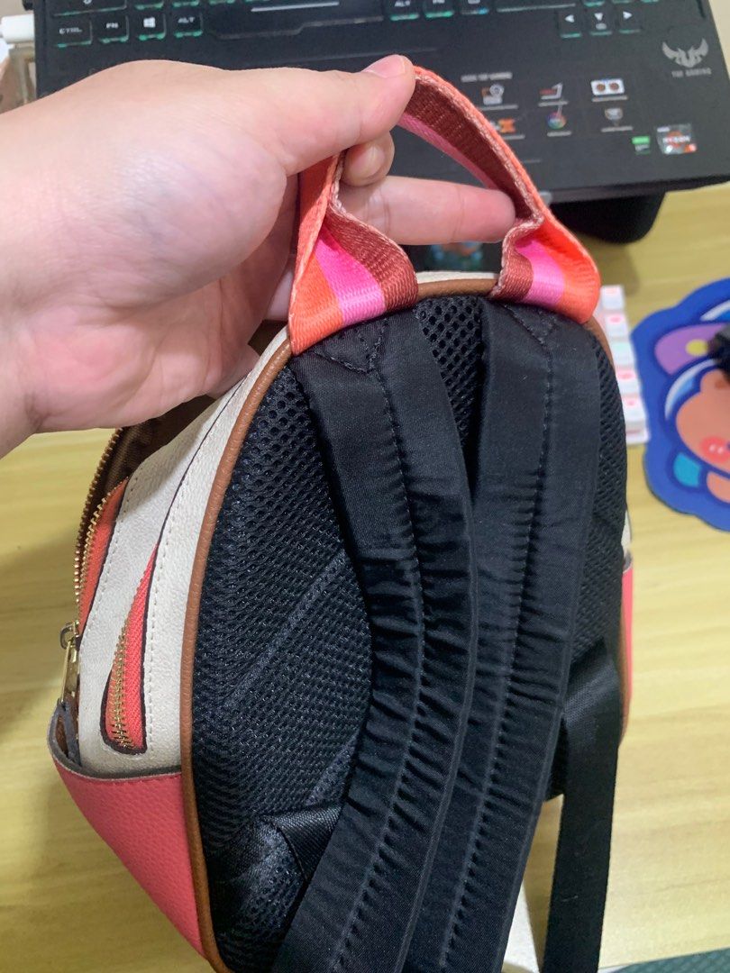Coach Mini Court Backpack (Category: Luxury Bags & Wallets) located in Paranaque City. Submitted by ml.nch (Listing ID 1383614771, Image 3). Description: Mini Court Backpack in Signature Canvas with Butterfly - never used, naluma na lang dahil nakatago - with slight bubbles sa front - was given as a gift - with dustbag.