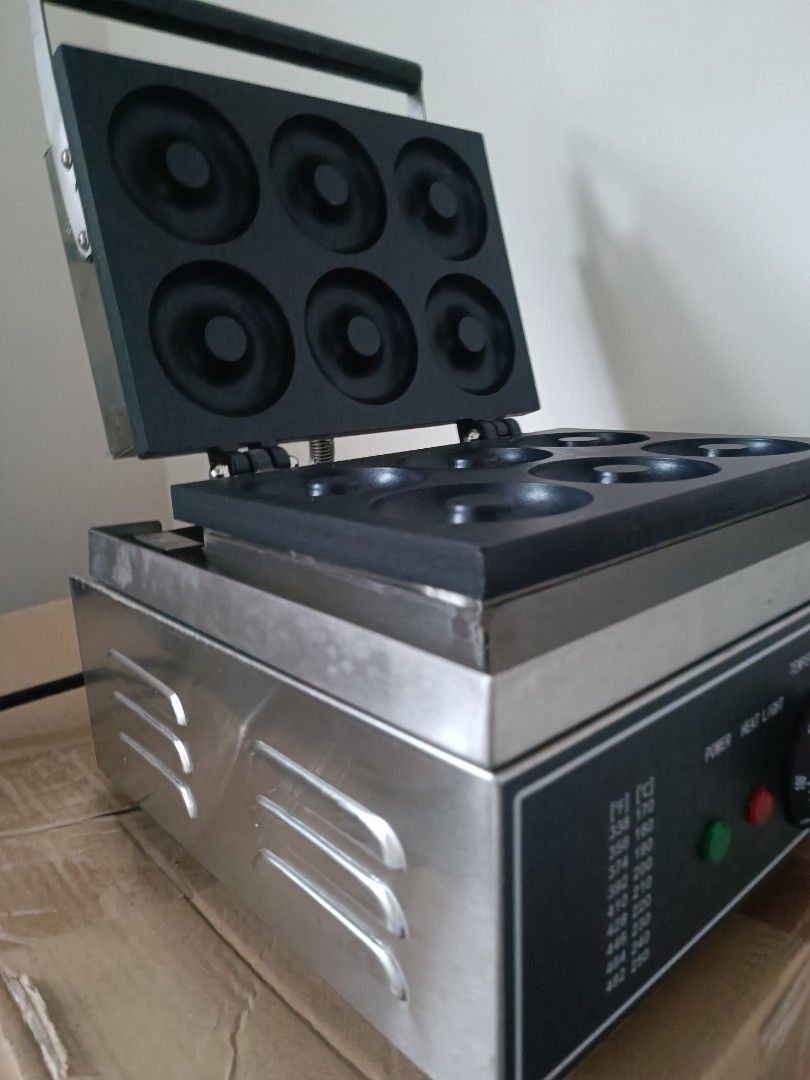 Electric Donut Maker Heavy Duty (Category: Breadmakers) located in Quezon City. Submitted by dada.chad (Listing ID 1383589121, Image 1). Description: Location: Near Ateneo, QC or Summerhills Exec Village, Antipolo.