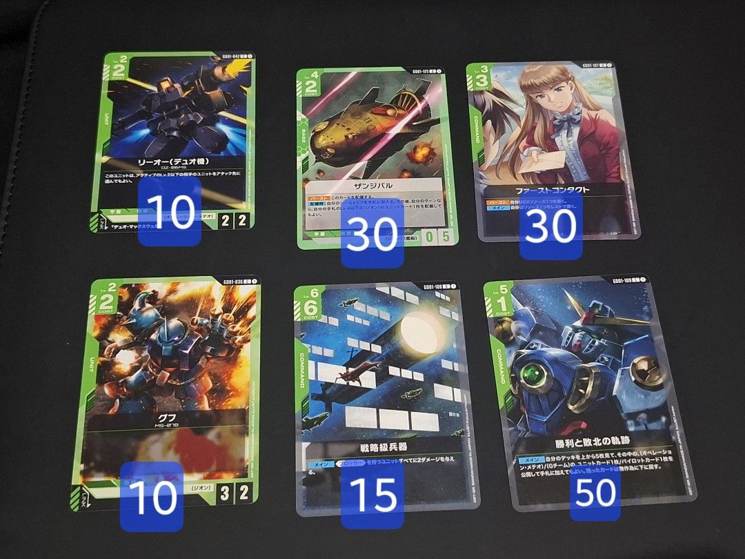 Gundam Newtype Rising TCG (Green type) (Category: Raw Singles) located in Quezon City. Submitted by beegrc (Listing ID 1383619791, Image 3). Description: Selling only! (READ FIRST BEFORE INQUIRING) *Send a screenshot of the card for faster inquiry.* Price is PER CARD! see pics. 📍MEET-UP - Le Village foodpark (E.rodriguez near Banawe QC) Or 📍Shipping (PRIORITY!) *METRO MANILA ONLY! Grab/Lalamove (Buyers expense and arrangement). 📍MOP: BPI/Gcash