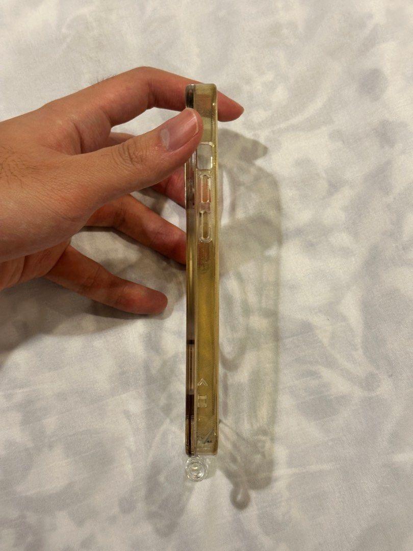 Iphone 14 Pro Clear Magsafe Case (Category: Cases & Sleeves) located in Muntinlupa City. Submitted by alabang__thrift (Listing ID 1383618456, Image 3). Description: Iphone 14 Pro Clear Magsafe Case Topologie case Can hook to a strap Purchased in Japan for 3k Issue: yellowing Alabang area .