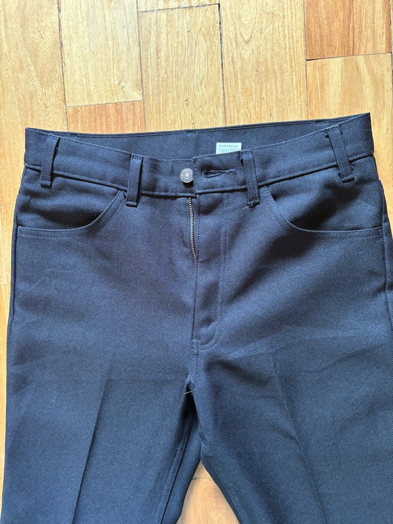 Levi's black trousers (Category: Trousers) located in Marikina City. Submitted by surity99 (Listing ID 1383487507, Image 1). Description: Up for sale is a pair of Vintage Levi's trousers in black Size on tag is W33xL32 Slim fit with flare bottoms and creases Measurements(inches): Waist 15 Rise 11 Thighs 11 Inseam 29.5 Leg opening 9 .