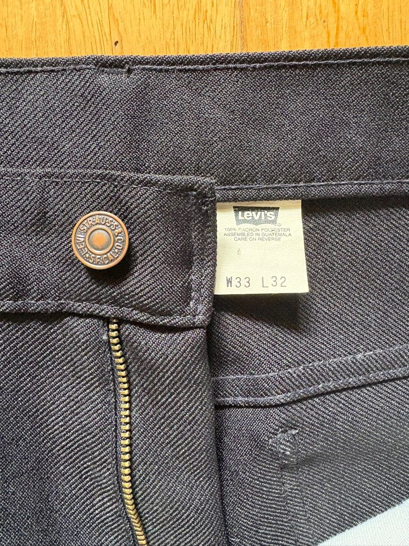 Levi's black trousers (Category: Trousers) located in Marikina City. Submitted by surity99 (Listing ID 1383487507, Image 2). Description: Up for sale is a pair of Vintage Levi's trousers in black Size on tag is W33xL32 Slim fit with flare bottoms and creases Measurements(inches): Waist 15 Rise 11 Thighs 11 Inseam 29.5 Leg opening 9 .