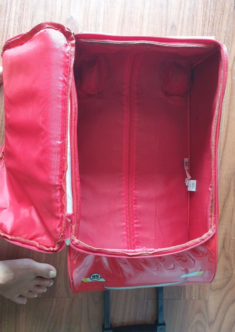 Lightning McQueen Luggage for Kids (Category: Luggage) located in Manila. Submitted by au0801 (Listing ID 1383564544, Image 2). Description: Lightning McQueen Luggage for Kids Measurement : 16"L x 13"W x 4"H With 4 wheels all in working condition With signs of usage and discoloration . Zipper is good..
