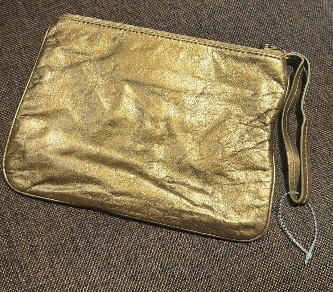 Marc Jacobs Wristlet (Category: Luxury Bags & Wallets) located in Bacolod City. Submitted by charmvault (Listing ID 1383545892, Image 3). Description: 📌Marc Jacobs Wristlet in Metallic Gold •US Bought🇺🇸 •Orig💯 •Genuine Leather •Preloved item | In Excellent condition •Can fit iphone pro max, card or coin wallet and small stuffs •Pass sa barat!!! 🏷️₱1200 last price + SF c/o Buyer.