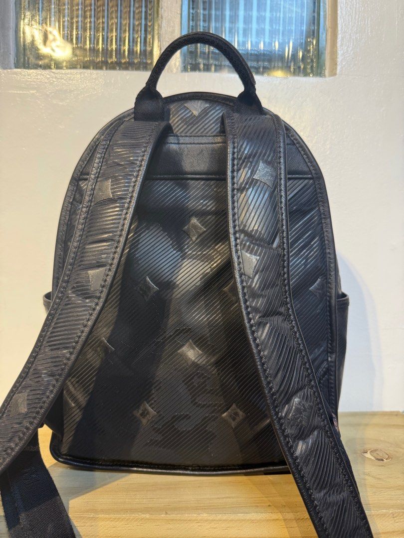 MCM Dieter Backpack Lion Camo Small Black (Category: Luxury Bags & Wallets) located in Pasig City. Submitted by armoire_deluxe (Listing ID 1383509894, Image 3). Description: Pre💕 item. In good condition..