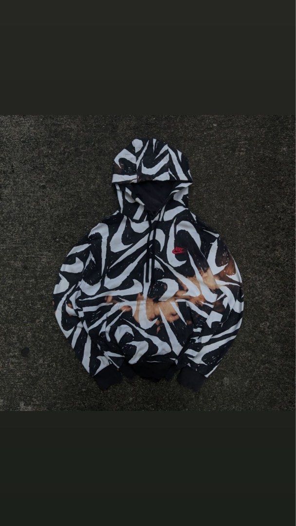 Nike AOP Hoodie (Category: Hoodies) located in Manila. Submitted by _vault (Listing ID 1383522952, Image 1). Description: with bleach stain (see pic).