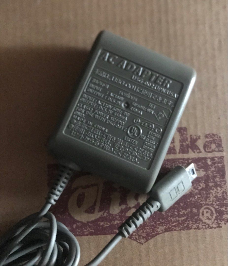 Nintendo Charger (Category: Other Gadgets) located in Quezon City. Submitted by 79moving (Listing ID 1383661574, Image 2). Description: Original Nintendo Charger Clean wire/no chips.