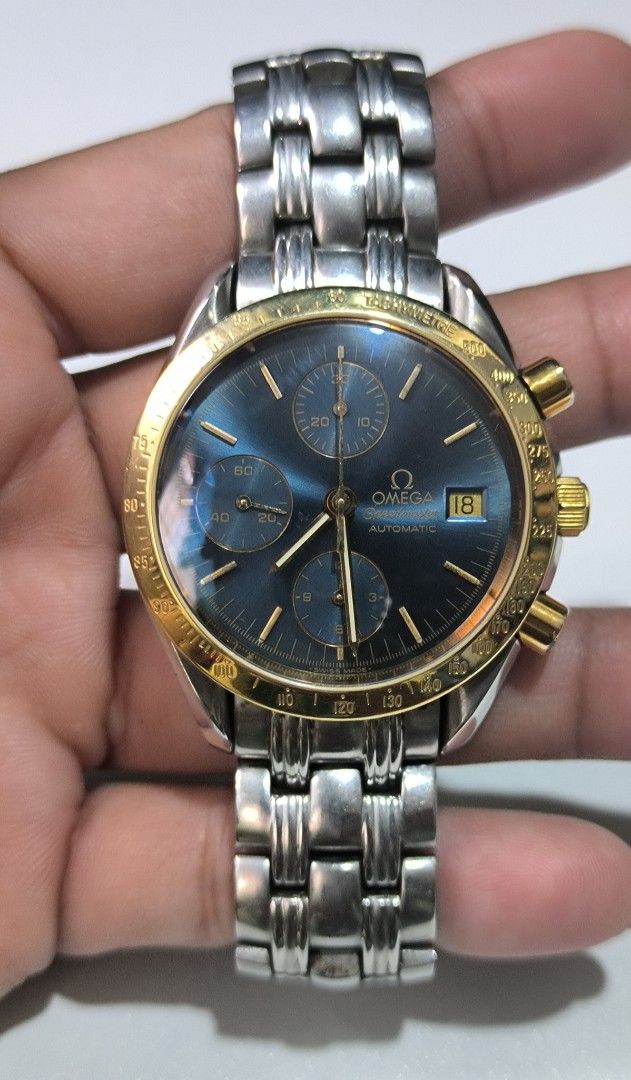 Omega Speedmaster (Category: Luxury Watches) located in Taguig. Submitted by j_watches007 (Listing ID 1364587647, Image 2). Description: Authentic Secondhand ⌚ Vintage Used Watch Omega Speedmaster Automatic Swiss Made Dia: Blue Bezel: 18K Yellow Gold Case: Stainless Steel Sappire Crystal YOR 1990s 39mm 7' wrist plus size. Omega Bracelet. Omega Buckle. ' Watch Only ' DISCLAIMER: IT'S OLD WATCHES EXPECT OF SOME SCRATCHES/SIGNS OF USAGE & PLEASE MAN