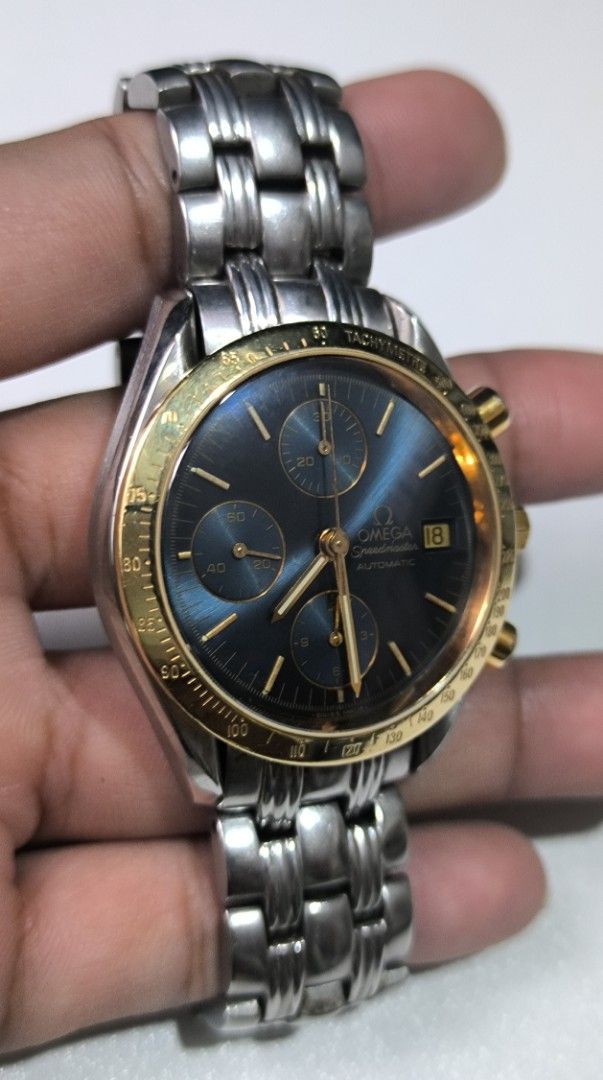 Omega Speedmaster (Category: Luxury Watches) located in Taguig. Submitted by j_watches007 (Listing ID 1364587647, Image 3). Description: Authentic Secondhand ⌚ Vintage Used Watch Omega Speedmaster Automatic Swiss Made Dia: Blue Bezel: 18K Yellow Gold Case: Stainless Steel Sappire Crystal YOR 1990s 39mm 7' wrist plus size. Omega Bracelet. Omega Buckle. ' Watch Only ' DISCLAIMER: IT'S OLD WATCHES EXPECT OF SOME SCRATCHES/SIGNS OF USAGE & PLEASE MAN