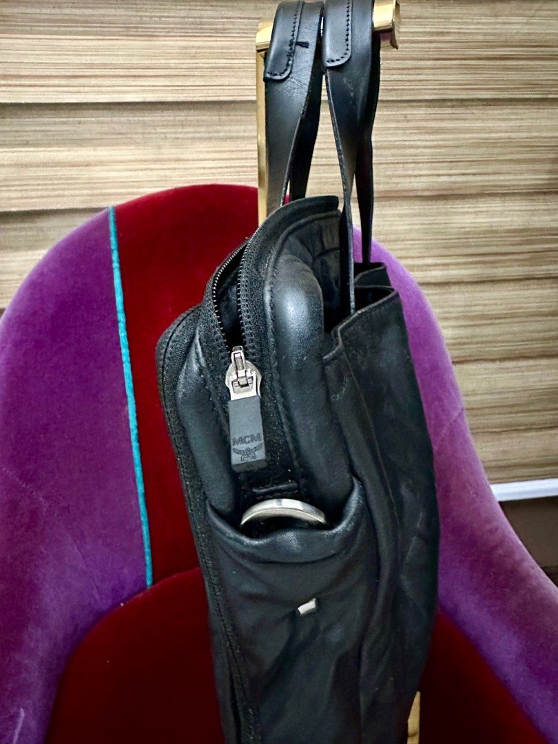 Original MCM Laptop Bag (Category: Luxury Bags & Wallets) located in Pasig City. Submitted by fashionalternatives (Listing ID 1383634710, Image 3). Description: Authentic MCM Laptop Bag or Document Bag Fits up to 15” laptop and other things Very Classy and Elegant in Actual made in Italy. Rare find Bag only #mcm #laptopbag #rare.