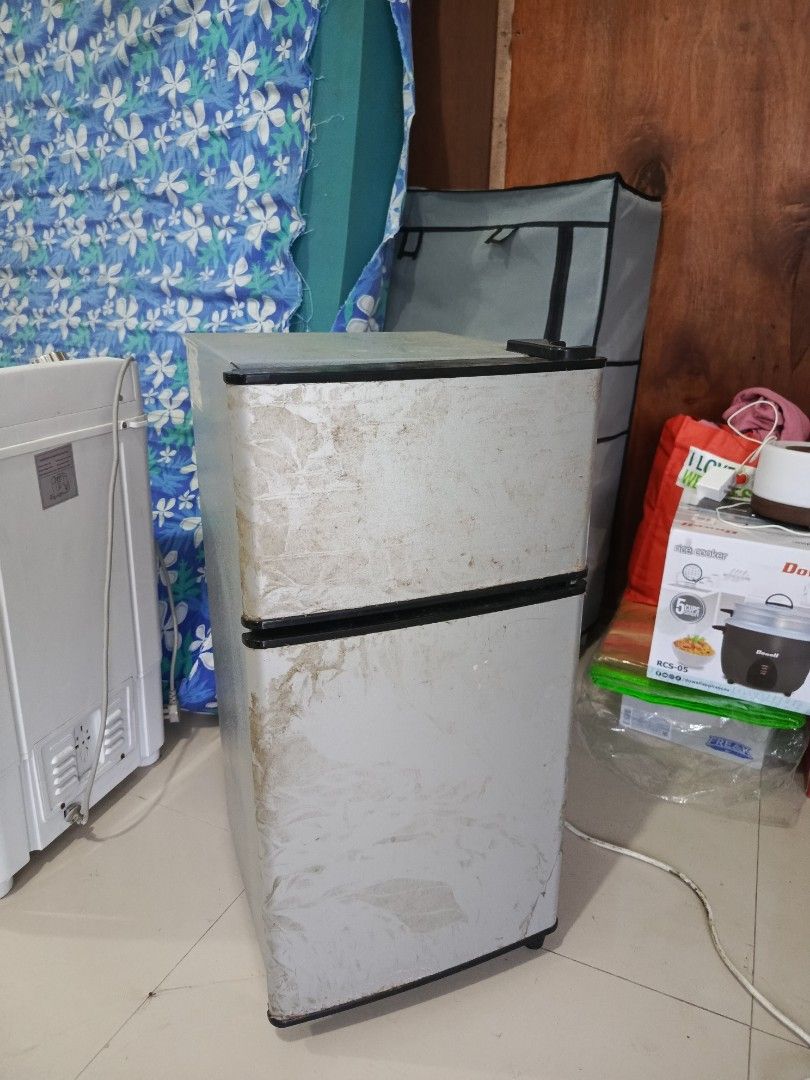 Small Ref (Category: Refrigerators and Freezers) located in Rizal. Submitted by chelsealoise (Listing ID 1383569770, Image 1). Description: Small refrigerator. with separate freezer. *may small tungkab sa freezer but still working. malakas freezer. decluttering - as is item. needs cleaning bawal sa maselan.