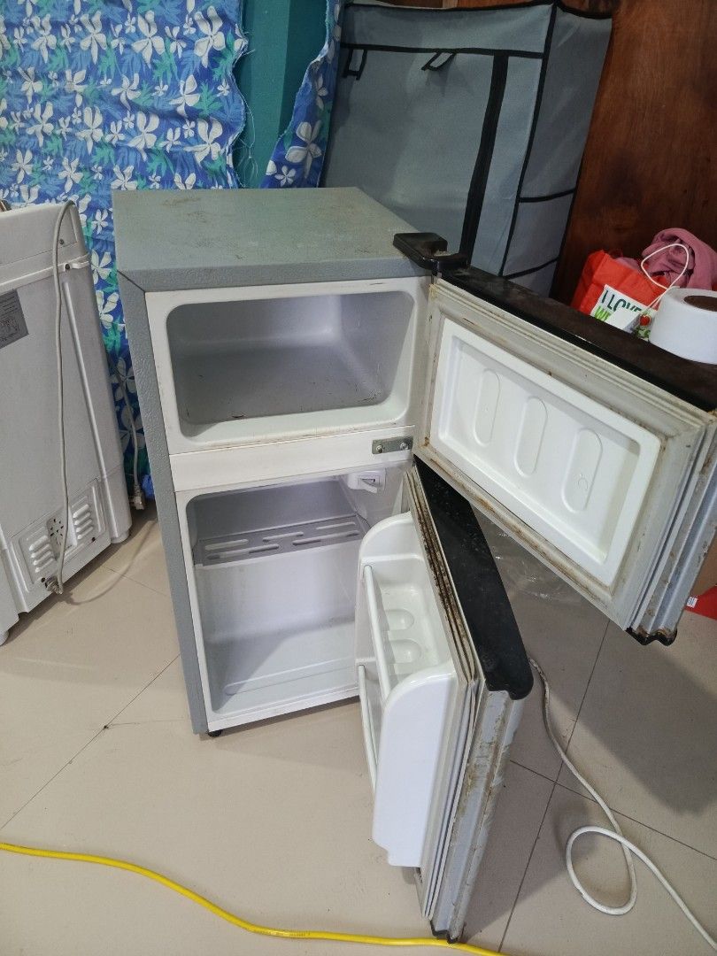Small Ref (Category: Refrigerators and Freezers) located in Rizal. Submitted by chelsealoise (Listing ID 1383569770, Image 2). Description: Small refrigerator. with separate freezer. *may small tungkab sa freezer but still working. malakas freezer. decluttering - as is item. needs cleaning bawal sa maselan.