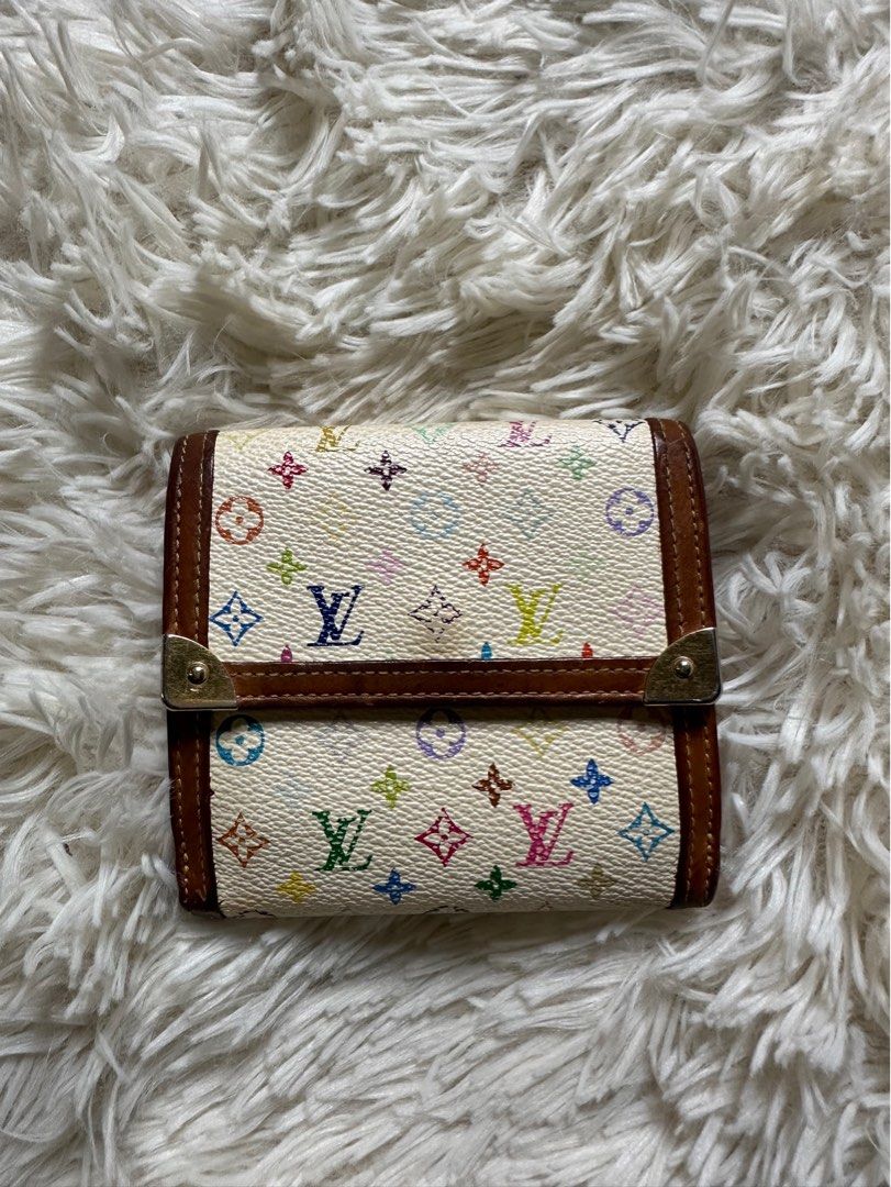 💯% AUTHENTIC Louis Vuitton Multicolor Monogram Wallet (Category: Wallets & Card holders) located in Cainta. Submitted by Micks81StorePH (Listing ID 1378402524, Image 1). Description: I bought it in Japan.🇯🇵 Vachetta leather trim Press-stud fastening Internal card slots Logo-engraved gold-tone hardware I'm open to reasonable offers. 😊.