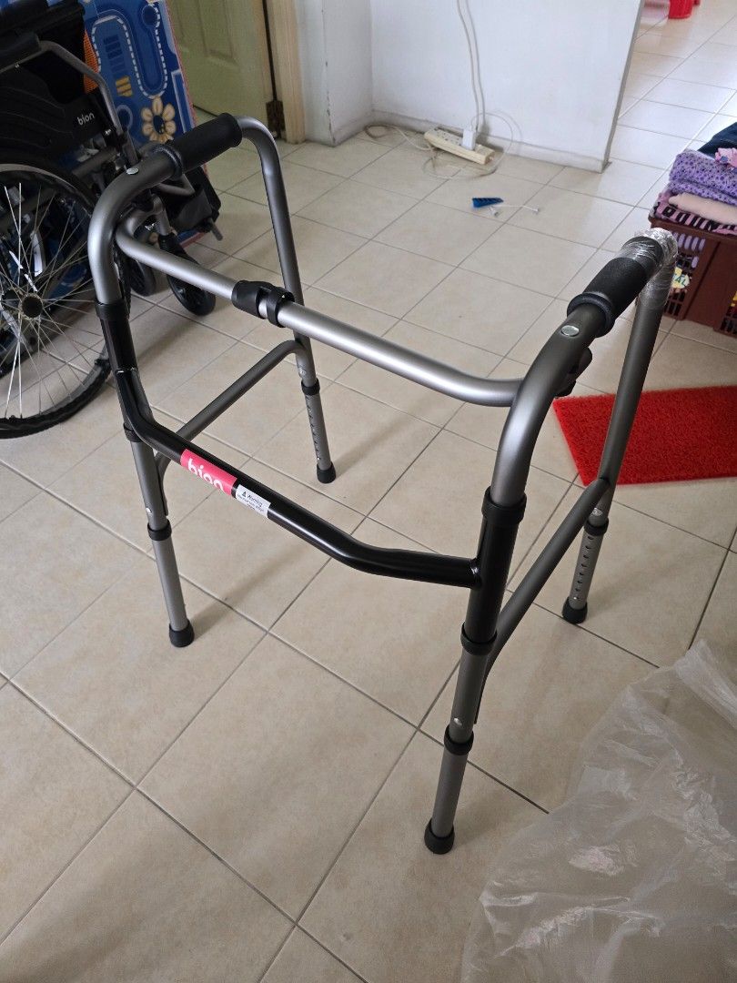 Adjustable Walking frame (Category: Other Assistive Aids) located in Singapore. Submitted by gudetamatamaa (Listing ID 1378368657, Image 1). Description: Self collection at Boon lay only. - Adjustable walker in good condition - Sturdy and reliable design - Features adjustable height settings - Comfortable hand grips for ease of use - Provides mobility assistance - Please view photos for details.