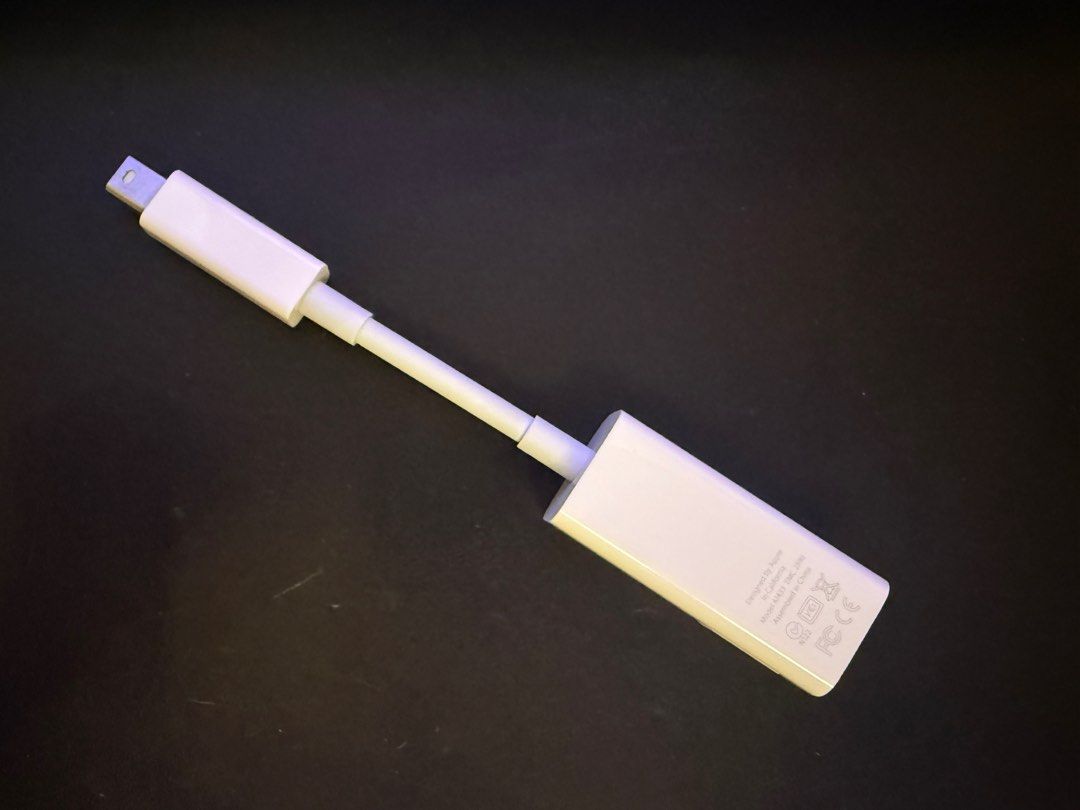 Apple Thunderbolt to LAN Ethernet Adapter (Category: Cables & Adaptors) located in Singapore. Submitted by garage168 (Listing ID 1378482681, Image 1). Description: .