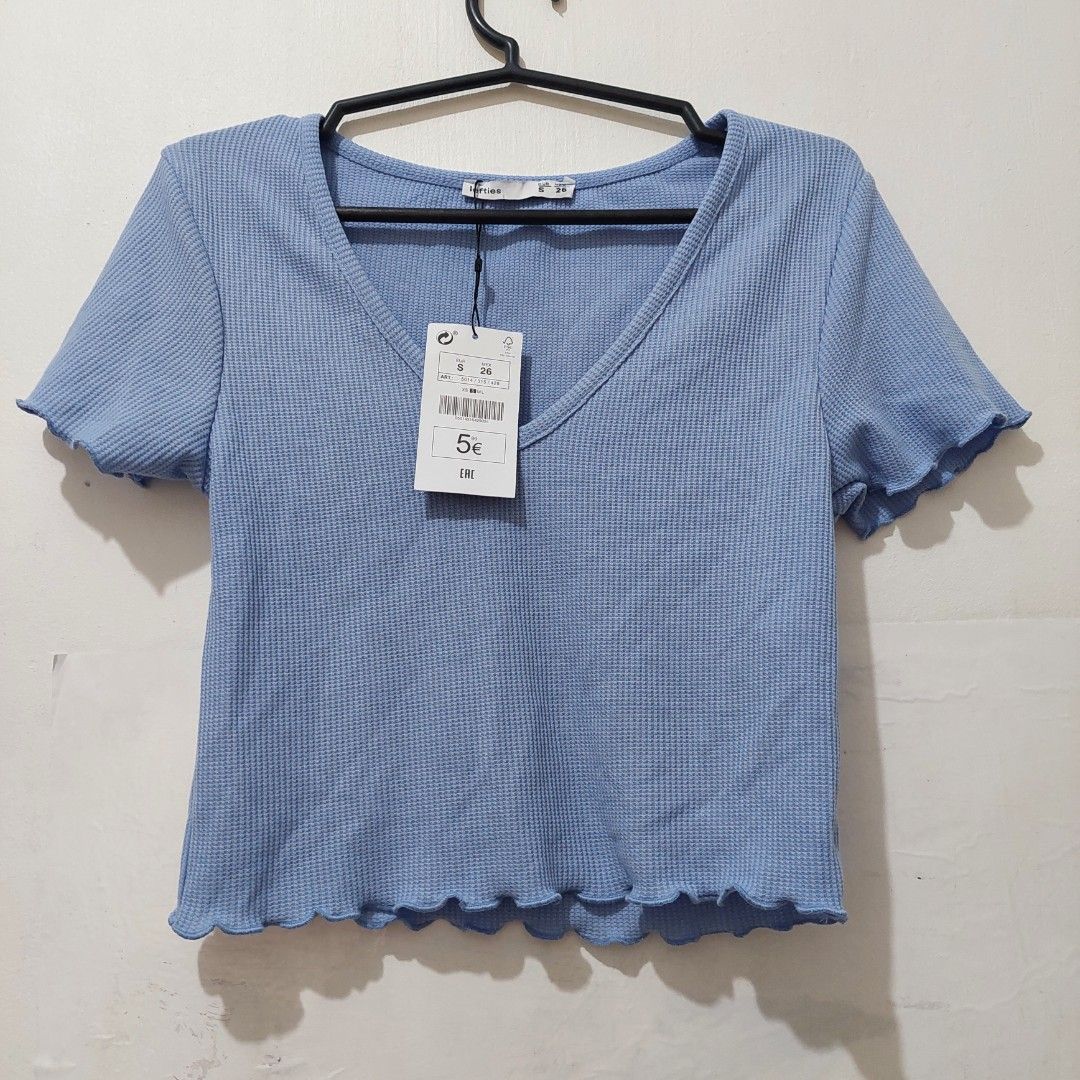 Aqua Blue V neck Shirt top (Category: Shirts) located in Caloocan City. Submitted by mebs_collection (Listing ID 1378336180, Image 2). Description: can fit up to M.