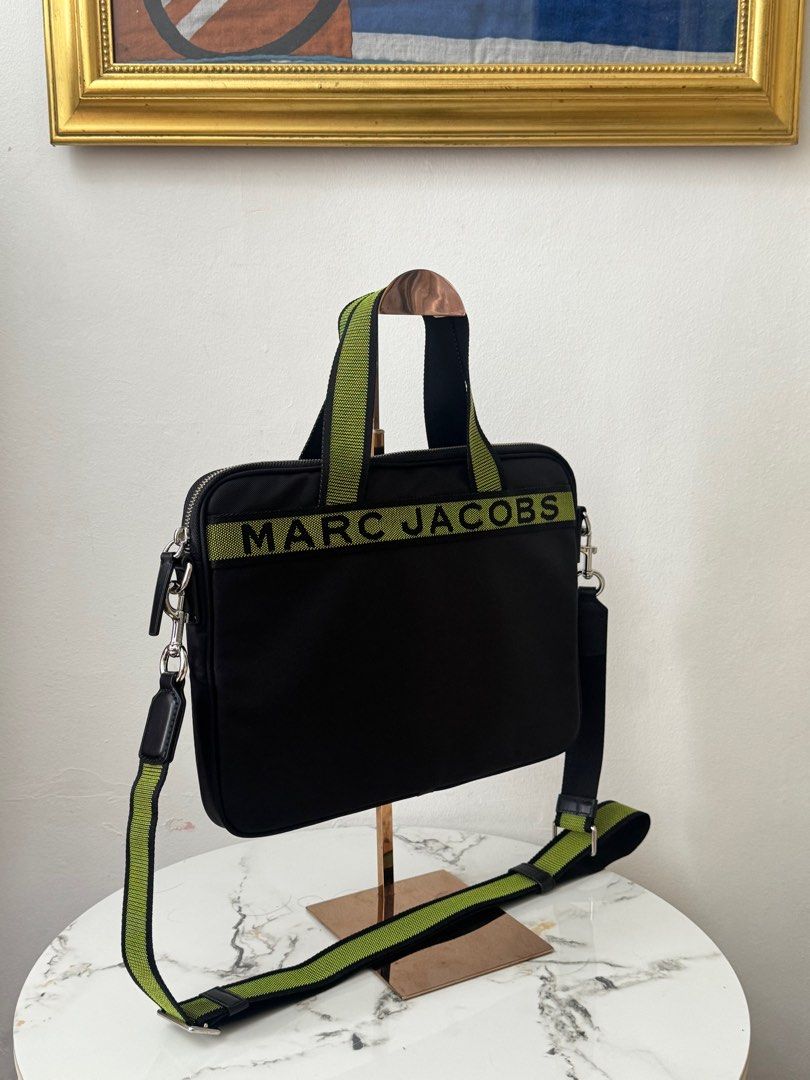Authentic marc jacob laptop bag (Category: Luxury Bags & Wallets) located in Rizal. Submitted by houseofbell (Listing ID 1378361257, Image 2). Description: Excellent condition Likenew Nylon material Fit 13 inches macbook laptop.
