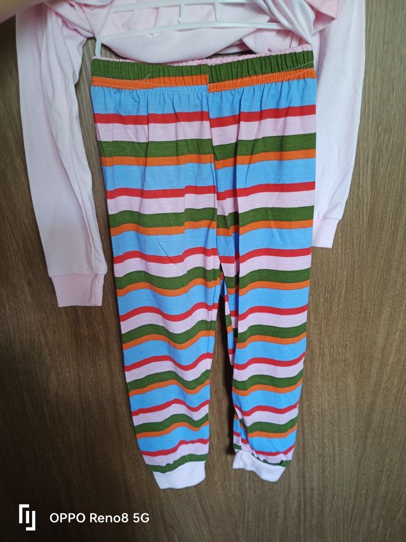Baby Has Elsa Pajamas - Size 110cm (Category: Babies & Kids Fashion) located in Singapore. Submitted by erisoung (Listing ID 1378435967, Image 2). Description: - Adorable kids pajamas set. - Features Elsa from Frozen. - Pink top with Elsa graphic. - Striped pants. - Made of 95% cotton. - Perfect for your kids! -size110(5y).