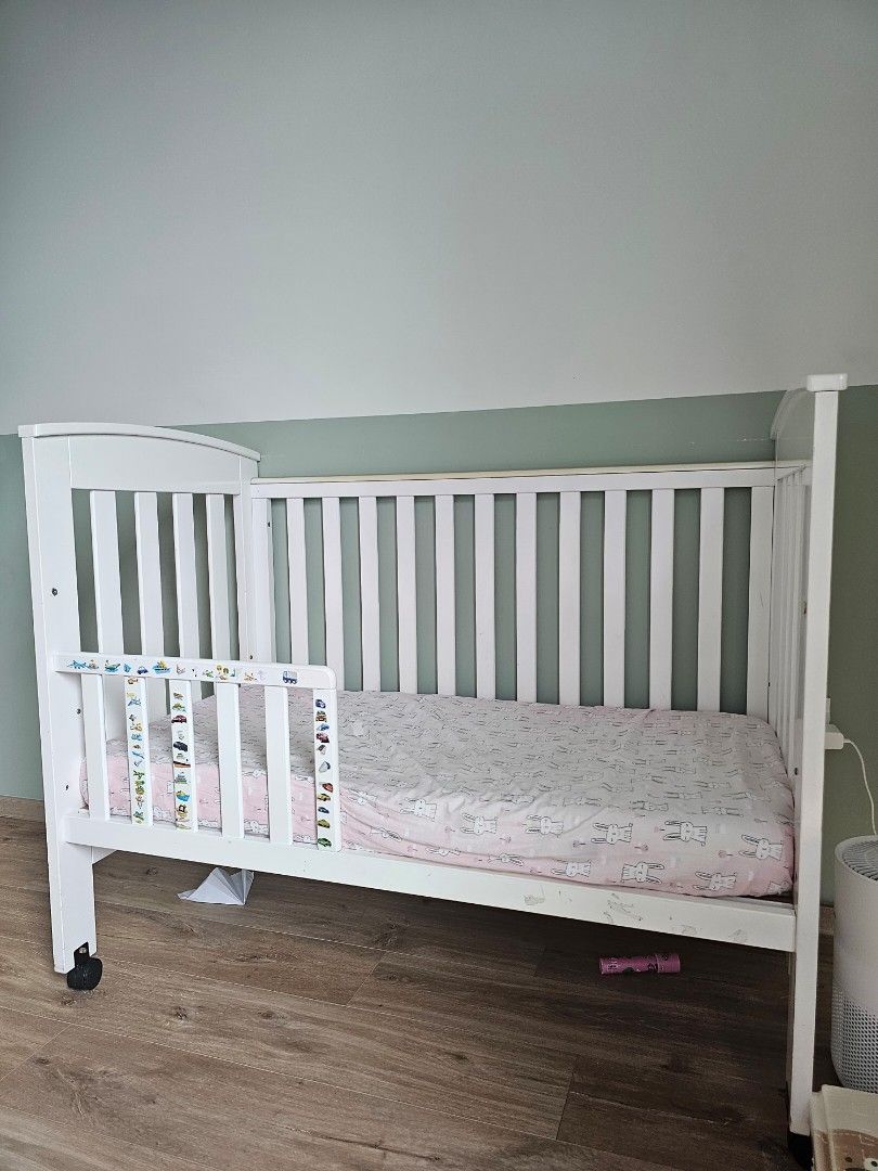 Baby Toddler Bed (Category: Childrens' Beds) located in Singapore. Submitted by highonsugar (Listing ID 1378374716, Image 1). Description: Baby-Toddler Milano bed 70x120cm Made of solid wood Easy to manoeuvre with 4 x lockable wheels Adjustable side guard, removable side guard. Well used but in very good condition. Everything is function with some minor scratches on the legs. Comes with premium anti-dustmite bamboo foam mattress that is fairly ne