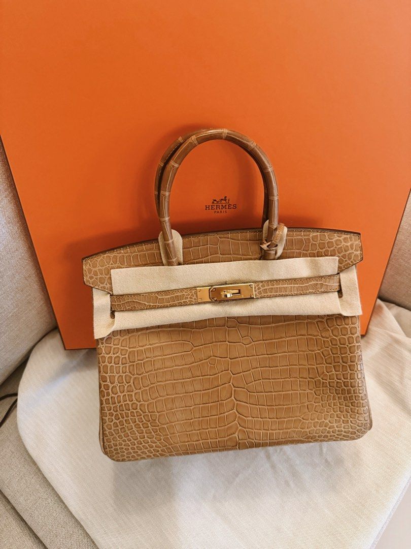 Birkin 30 kraft croc (Category: Luxury Bags & Wallets) located in Taguig. Submitted by timelesstotesph (Listing ID 1378489689, Image 3). Description: Dm for more details and more photos Onhand Meetup/pickup anywhere in MNL but preferably in Taguig.