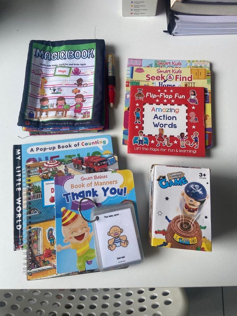 Books and Mini pop up pirate (Category: Children's Books) located in Quezon City. Submitted by francescacc (Listing ID 1378341516, Image 1). Description: Get all interactive books for 550 See flaw seen in last pic Other books in good condition Action words still new (with plastic) Mini pop up pirate may have some swords lost.
