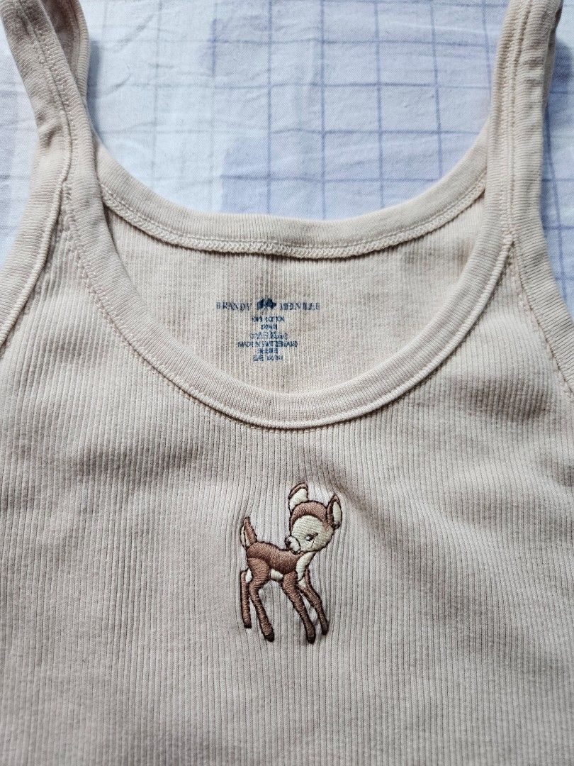 bnwt brandy melville john galt hallie cream deer tank top (Category: Sleeveless) located in Singapore. Submitted by j1ngst (Listing ID 1378347590, Image 3). Description: bnwt, no flaws! super stretchy & soft material! selling @ rtp bc i rly like the top & if no one wants it imma keep it <3.