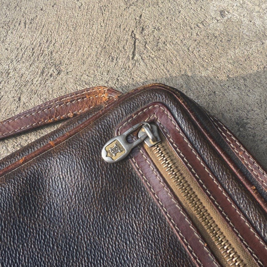 CELINE Vintage macadam pouch bag (Category: Luxury Bags & Wallets) located in Tagbilaran City. Submitted by thriftsyndrome (Listing ID 1378428571, Image 3). Description: CELINE Vintage macadam pouch bag Issue : zipper needs fixing , front pocket fabric is disconnected 450+ sf (very negotiable).