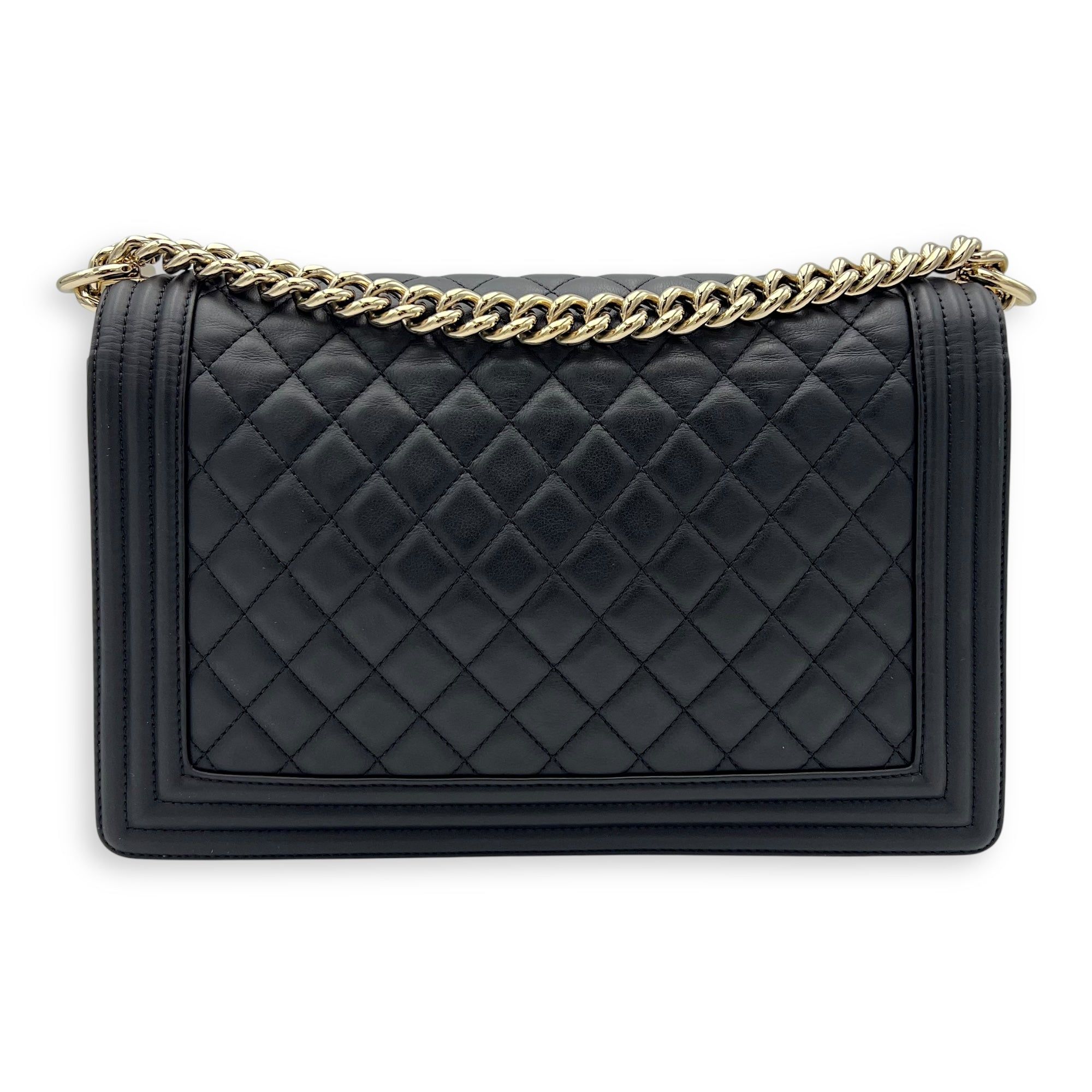 Chanel Boy New Medium Black Shoulder Bag in Lambskin, Gold hardware (Category: Bags & Wallets) located in Singapore. Submitted by carousellluxury (Listing ID 1378354707, Image 2). Description: SKU S2506-006772DT Material Lambskin Size New Medium Color Black Hardware Gold Strap Included, non-detachable Dimension (L)28cm x (H)17cm x (W)7.5cm Accessories Dust Bag, Authentication Card, Series 23641262 Circa Est 2016-2017 Condition - Surface: Light cr