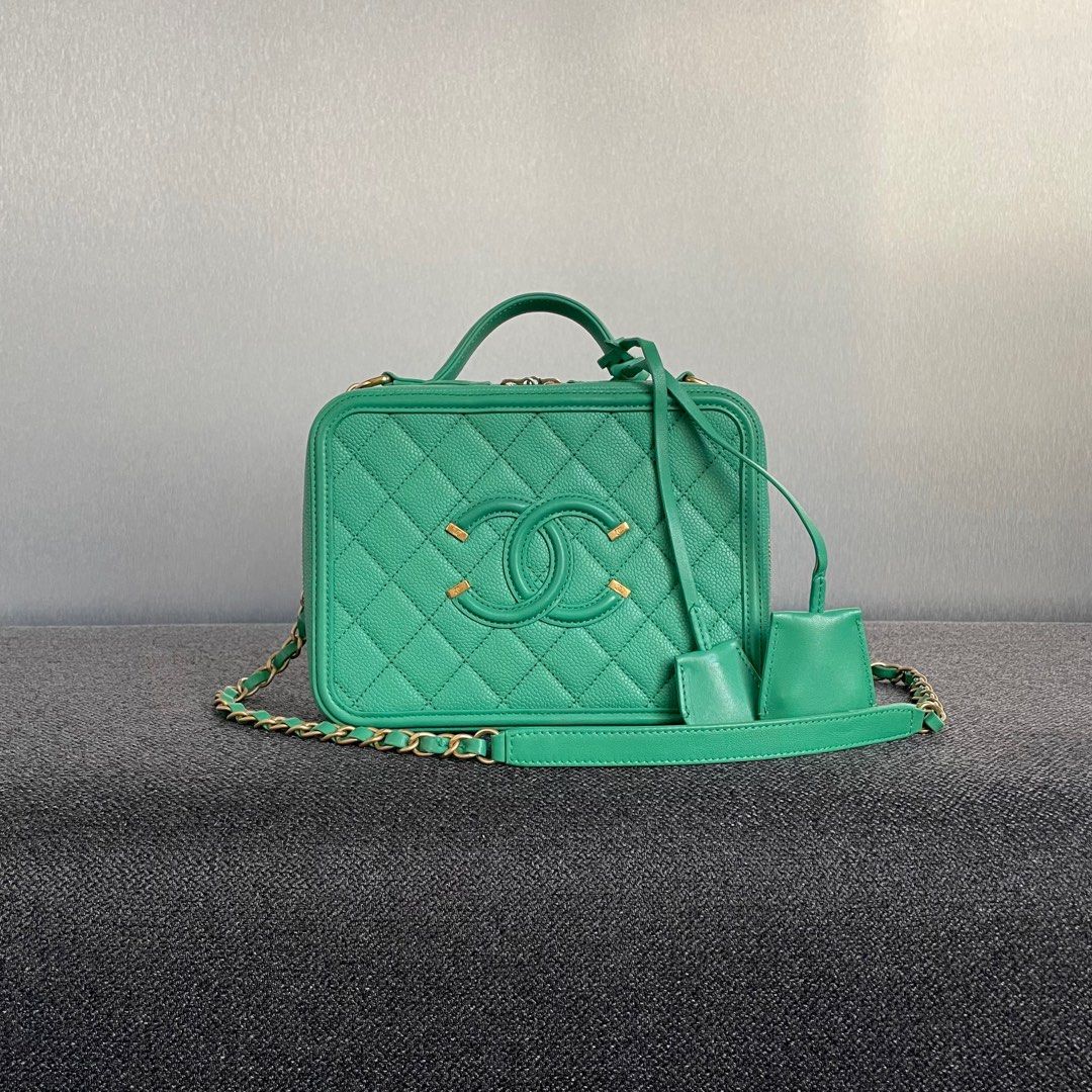 Chanel CC Filigree Vanity Medium Caviar Green Gold hardware (Category: Bags & Wallets) located in Singapore. Submitted by yasfinds (Listing ID 1378452139, Image 1). Description: Chanel CC Filigree Vanity Very good condition Medium L20 H16 D8cm Chain drop 48cm Caviar Green Gold hardware Series 24 (year 2017) Comes with Authenticity card and dust bag only E2806 App: Kai +65 9 8 2 6 3 4 7 5 ✔️Authenticity Guaranteed ❌NO IG Direct message 📕Priority 