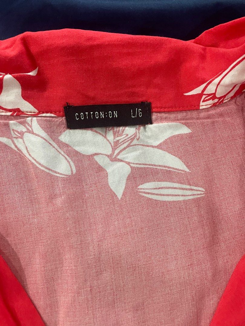 Cotton on front tie shirt (Category: Blouses) located in Pasig City. Submitted by ctg222 (Listing ID 1378531363, Image 2). Description: Used a few times only Not abused and very well taken care of Mop: gcash or bpi Shipping via j&t or lalamove c/o buyer.