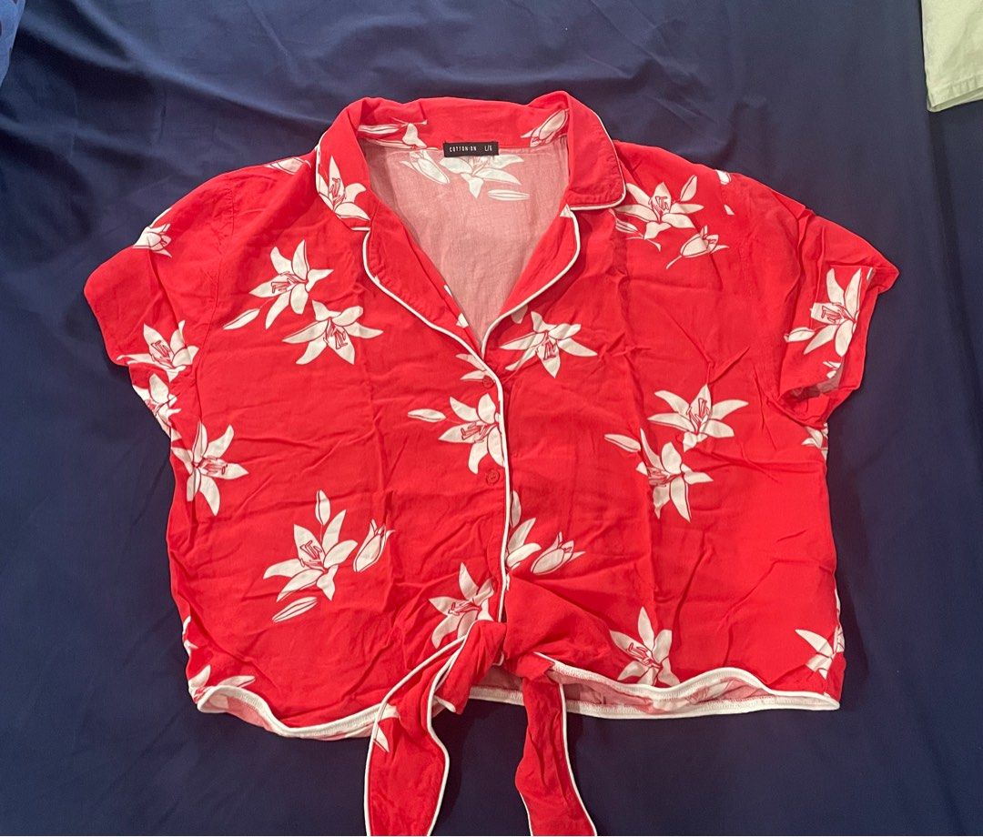 Cotton on front tie shirt (Category: Blouses) located in Pasig City. Submitted by ctg222 (Listing ID 1378531363, Image 1). Description: Used a few times only Not abused and very well taken care of Mop: gcash or bpi Shipping via j&t or lalamove c/o buyer.