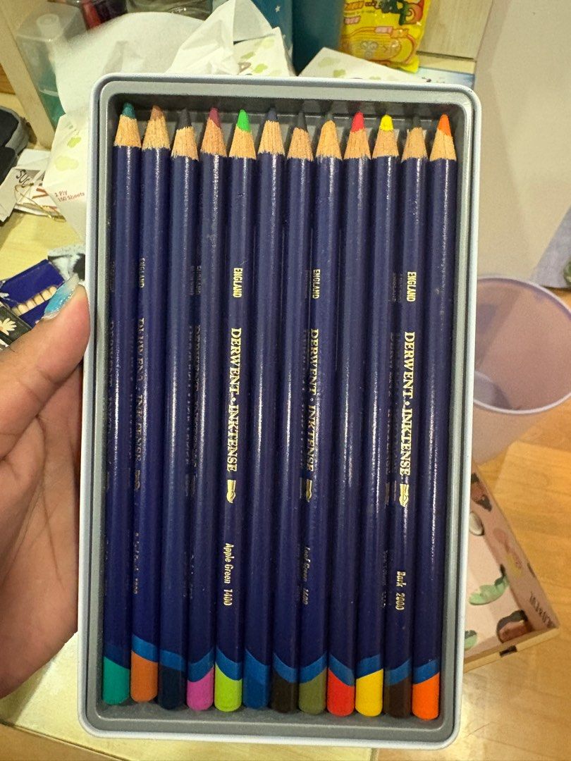 Derwent Inktense 12 Colored Pencils Set (Category: Stationery & School Supplies) located in Singapore. Submitted by twobrokejournallers (Listing ID 1378481359, Image 2). Description: Box has some smudge on it as seen in the picture but pencils were barely used. .