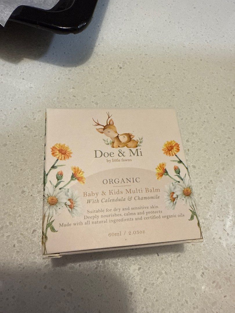 Doe & Mi Organic Baby & Kids Multi Balm (Category: Baby Toiletries & Grooming) located in Singapore. Submitted by jarylteoh.1 (Listing ID 1378452666, Image 1). Description: Doe & Mi Organic Baby & Kids Multi Balm. Suitable for dry and sensitive skin. Contains Calendula & Chamomile. Deeply nourishes, calms, and protects. Made with all natural ingredients and certified organic oils..