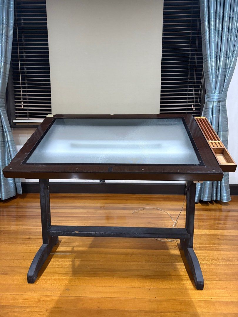 DRAFTING TABLE with light for Architecture (Category: Tables & Sets) located in San Juan City. Submitted by artfilmore (Listing ID 1378482651, Image 1). Description: Good for architecture Drafting With light and switch With stationary holder 6 adjustable heights Foldable flat for easier storage .