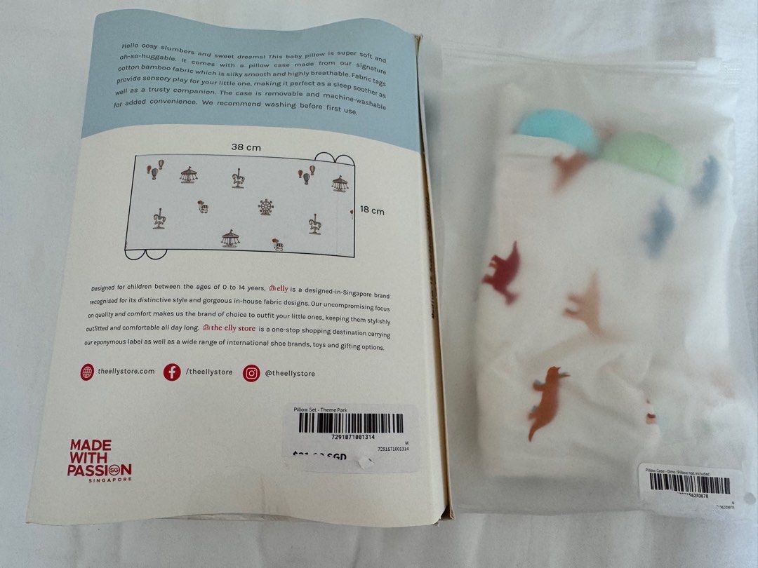Elly Bamboo Cotton Pillow Set (Category: Childrens' Beds) located in Singapore. Submitted by llama2 (Listing ID 1378352887, Image 2). Description: Brand new Elly Bamboo Cotton Pillow Set in Theme Park design. Includes pillowcase with cushion insert. Made with soft, breathable bamboo cotton fabric. Suitable for children aged 0-14 years. Machine washable for added convenience. Never used, still in original packaging. Additional dinosaur pillow cove