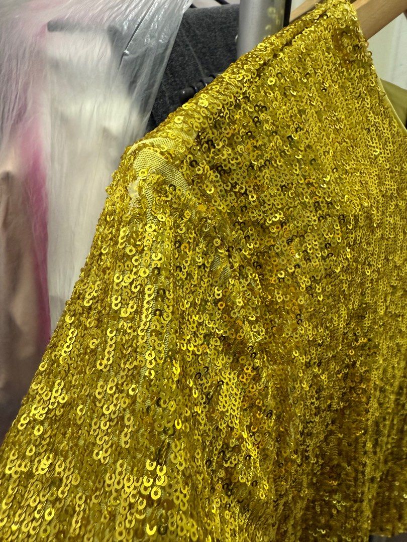 Express Gold Sequins Party Top (Category: Blouses) located in Antipolo. Submitted by harlowwillow (Listing ID 1378346821, Image 2). Description: XL on tag Brand cut tag - Express Project Top for those who know how to fix Flaw: Sequins are starting to fall off in few certain small parts pero hindi ganun kahalata Item rate: 8/10.