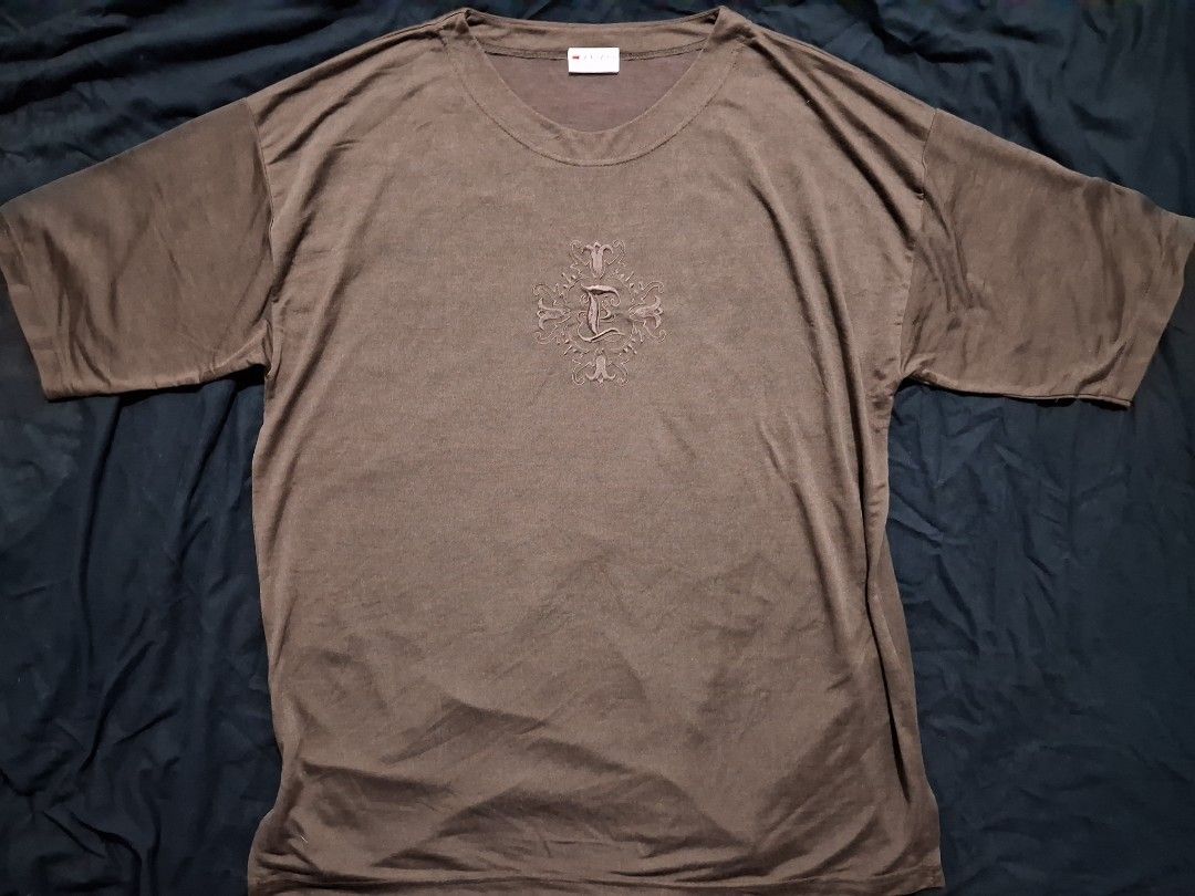 Fabiani Brown y2k Cross Shirt (Category: Tshirts & Polo Shirts ) located in Caloocan City. Submitted by parkpeter (Listing ID 1378499233, Image 1). Description: 23 width 27 length.