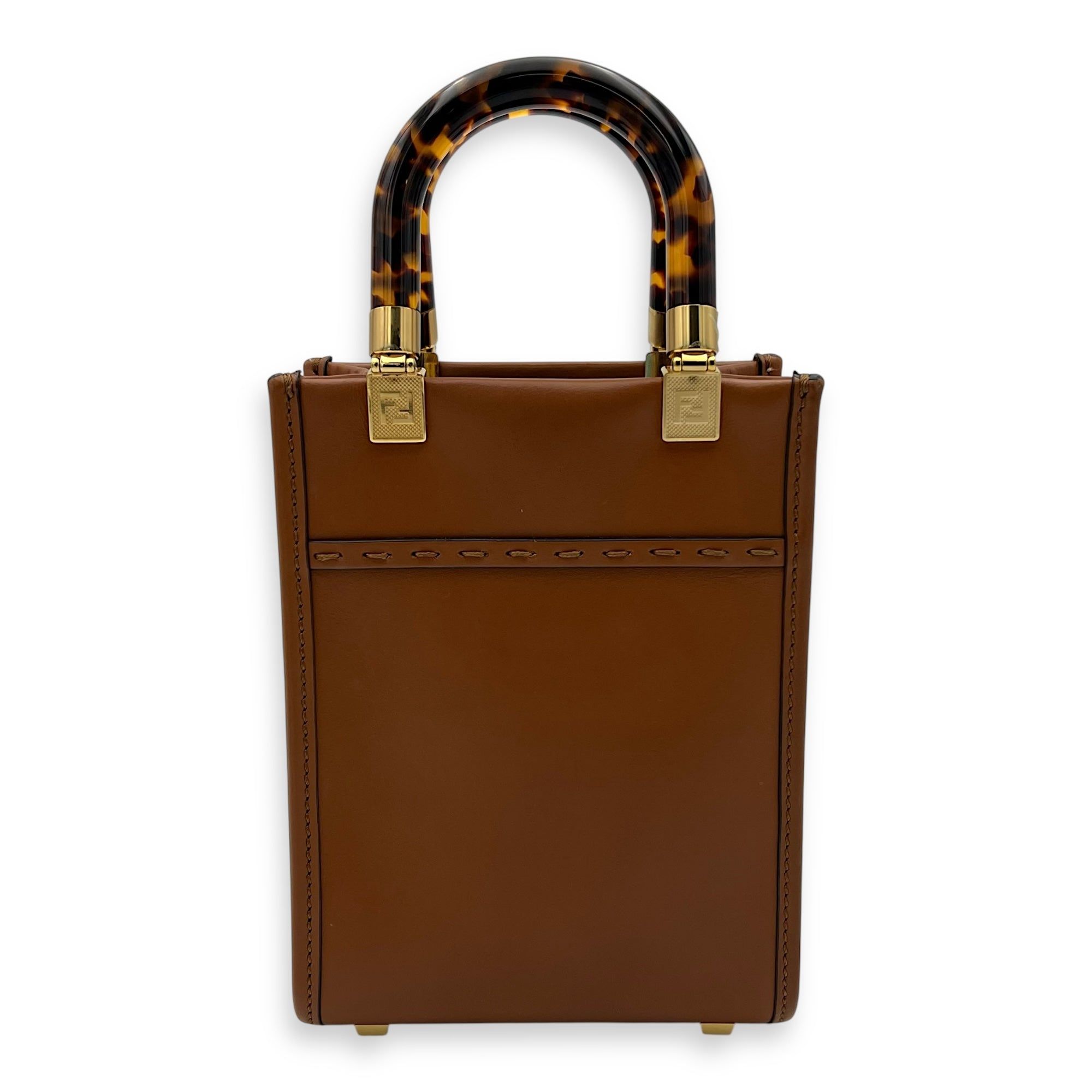Fendi Sunshine Top Handle Bag Mini Brown in Calfskin, Gold hardware (Category: Bags & Wallets) located in Singapore. Submitted by carousellluxury (Listing ID 1378404533, Image 2). Description: SKU S2506-006885AN Material Calfskin Size Mini Color Brown Hardware Gold Strap Included, non-detachable and adjustable Dimension (L)13cm x (H)17cm x (W)5cm Accessories Dust Bag, Series 8BS051 ABVL 219.0189 Circa Est NA Microchipped FALSE PS: Available for P
