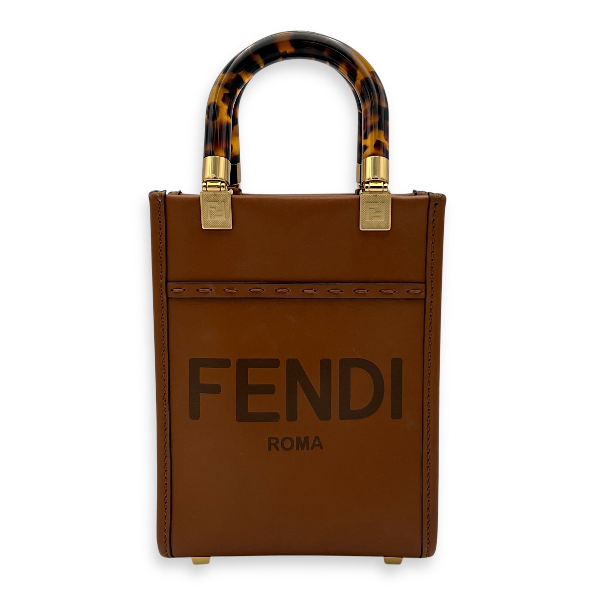 Fendi Sunshine Top Handle Bag Mini Brown in Calfskin, Gold hardware (Category: Bags & Wallets) located in Singapore. Submitted by carousellluxury (Listing ID 1378404533, Image 1). Description: SKU S2506-006885AN Material Calfskin Size Mini Color Brown Hardware Gold Strap Included, non-detachable and adjustable Dimension (L)13cm x (H)17cm x (W)5cm Accessories Dust Bag, Series 8BS051 ABVL 219.0189 Circa Est NA Microchipped FALSE PS: Available for P