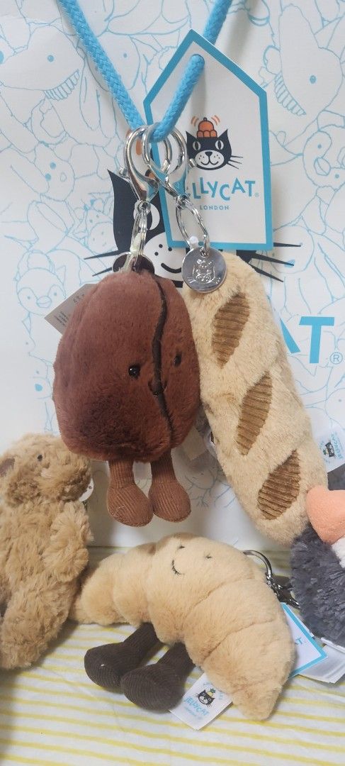 [Instock] Authentic Jellycat BNWT Amuseable Coffee bean/baguette charm (Category: Toys & Games) located in Singapore. Submitted by yunaarina (Listing ID 1378383337, Image 1). Description: I Sell only 💯Authentic Jellycat with BNWT !! Instock Jellycat can be collected on the same day too! Free Face Picking 💖 coffee bean$52 Jellycat Gift Bag is available as add on $10[got limited only] Premium Blue Jellycat Gift bag $20 prefer meetup @Hillion mall