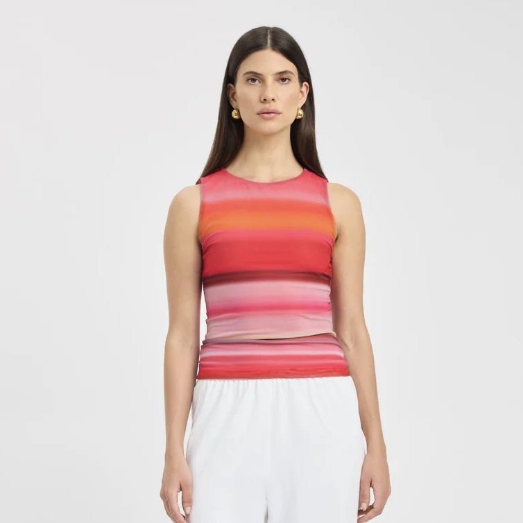 Kookai Rae stripe tank (Category: Sleeveless) located in Singapore. Submitted by salsyyy (Listing ID 1378443148, Image 3). Description: The Rae Tank is a sophisticated and stylish piece, adorned with a soft stripe prink with hues of pink, red, and yellow. The minimalist, sleeveless design and crew neckline provide a classic and versatile look. Pair it with tailored white pants to let the vibrant print make a statement. MAIN: 83% POLYESTER, 17% EL