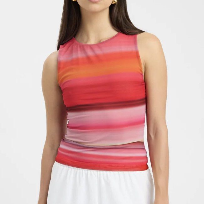 Kookai Rae stripe tank (Category: Sleeveless) located in Singapore. Submitted by salsyyy (Listing ID 1378443148, Image 1). Description: The Rae Tank is a sophisticated and stylish piece, adorned with a soft stripe prink with hues of pink, red, and yellow. The minimalist, sleeveless design and crew neckline provide a classic and versatile look. Pair it with tailored white pants to let the vibrant print make a statement. MAIN: 83% POLYESTER, 17% EL