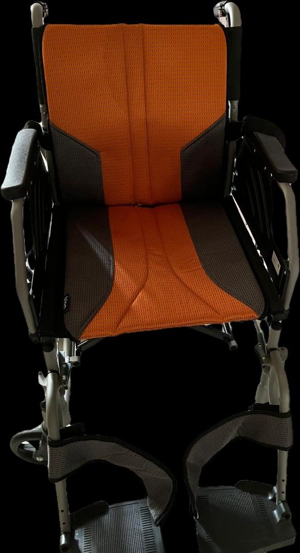 Lightweight Wheelchair - Orange and Grey (Category: Wheelchairs) located in Singapore. Submitted by babymama_essentials (Listing ID 1378398105, Image 2). Description: - Lightweight wheelchair - Comfortable orange and grey seat cushion, removable velcro for washing - Able to compact and handle bar, able to fold down and fit into car boot. - Includes footrests and armrests, able to lift up armrest/remove foot rest for easy transfer patient. - Durab