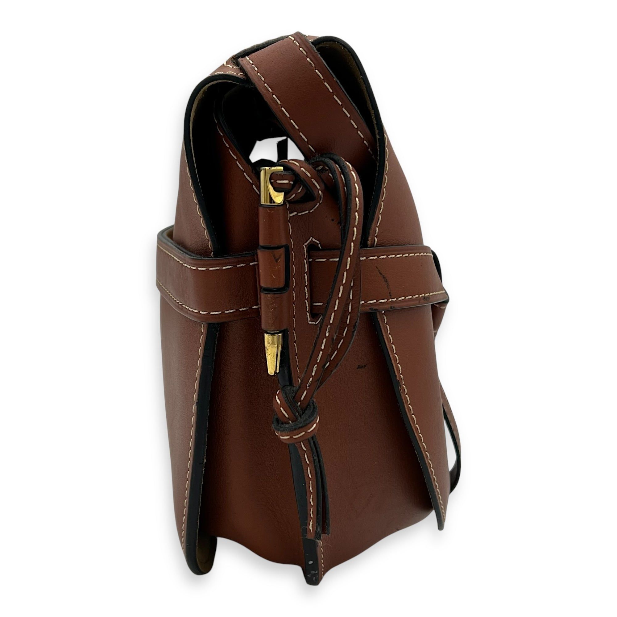 Loewe Gate Shoulder Bag Brown in Calfskin, Gold hardware (Category: Bags & Wallets) located in Singapore. Submitted by carousellluxury (Listing ID 1378404728, Image 3). Description: SKU S2507-006944AN Material Calfskin Color Brown Hardware Gold Strap Included, adjustable Dimension (L)30cm x (H)25cm x (W)10cm Accessories Series 061812 Circa Est 2018 Microchipped FALSE PS: Available for Private-Viewing, Standard and Express delivery - Surface: Scra