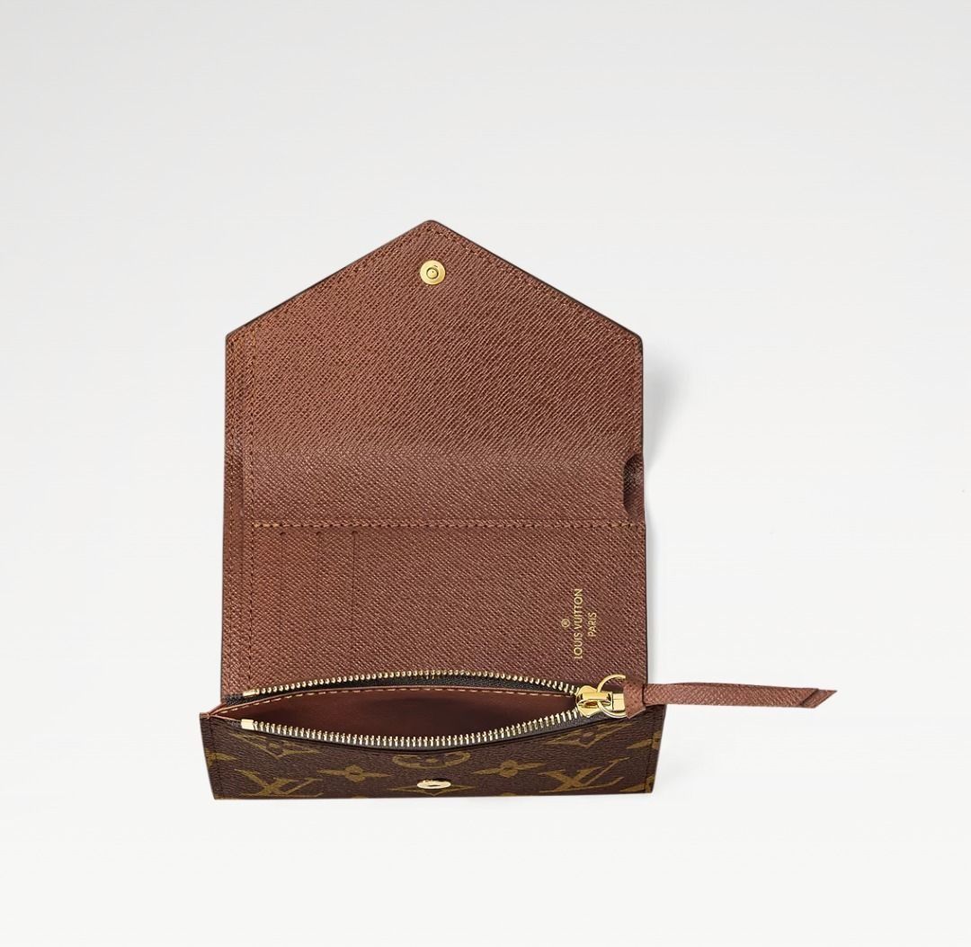 Louis Vuitton Victorine Wallet (Monogram) (Category: Luxury Bags & Wallets) located in Manila. Submitted by loverose7 (Listing ID 1378465628, Image 3). Description: ✨ Pre-Loved & Authentic! ✨ 🤎 Louis Vuitton Victorine Wallet – M62472 (Monogram) ✅ 100% Original | Purchased in Singapore 🎁 Comes with Box & Dust Bag The compact Victorine wallet in Monogram canvas combines femininity and functionality. It opens out to reveal many practical features,